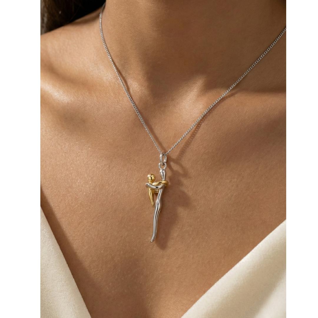 Eternal Love mother and child embrace pendant necklace worn on the neck
