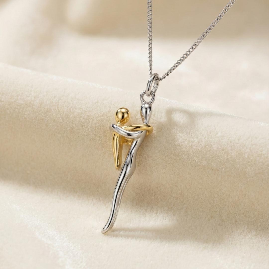 Eternal Love pendant necklace on cream fabric